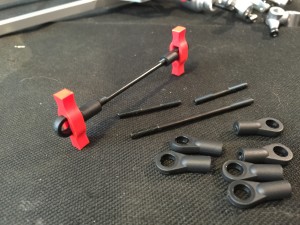 Kyosho includes these handy little thumb tools to help take the pain out of building turnbuckles.